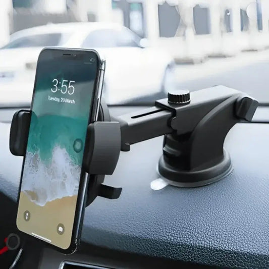 Car phone holder mounted on dashboard holding smartphone